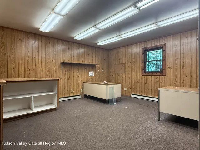 a room with furniture and window