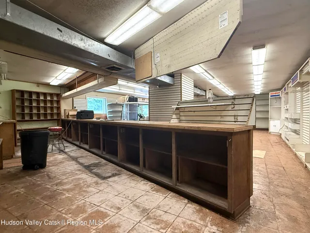 a view of a storage room with furniture