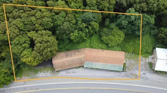 a view of a balcony with floor to ceiling windows