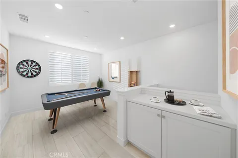 a room with furniture and wooden floor