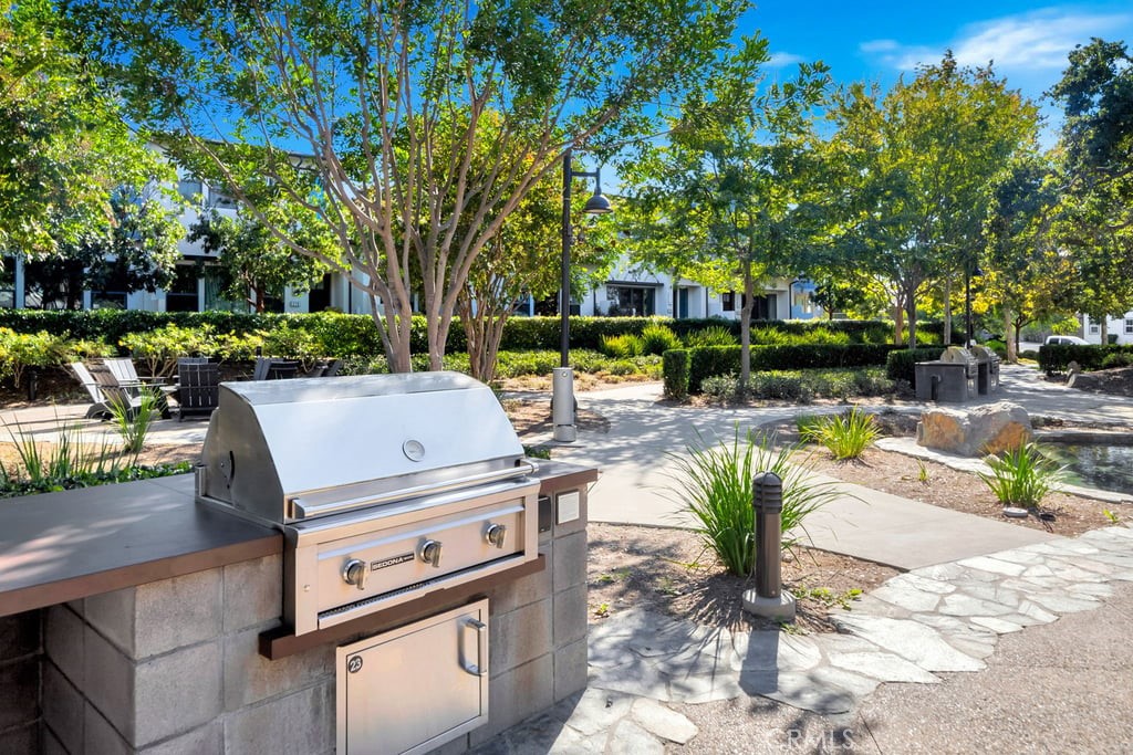 3040 Cove Street Rancho Mission Viejo, CA 92694 - Photo 40 of 44 a view of a backyard with sitting area