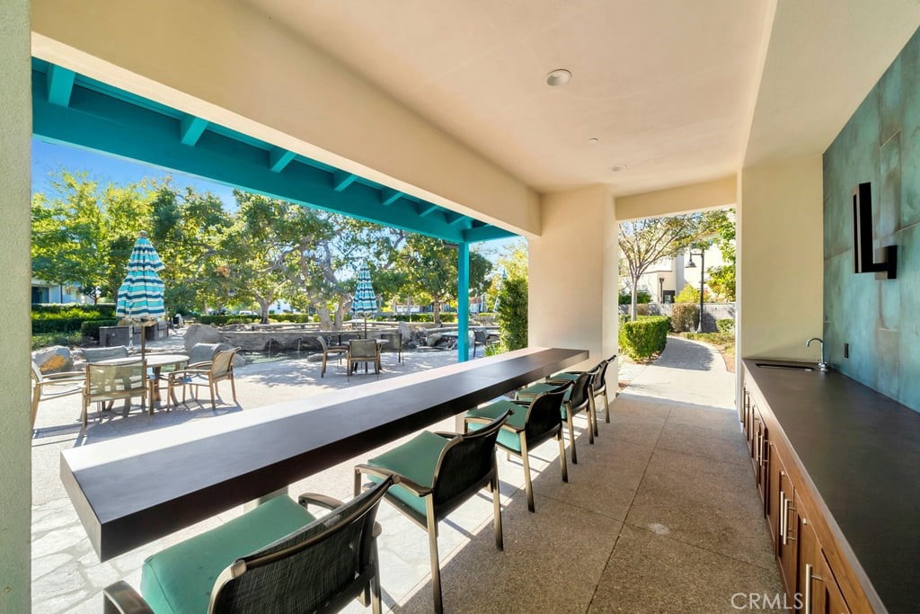 3040 Cove Street Rancho Mission Viejo, CA 92694 - Photo 41 of 44 a room with large windows and view of dining room