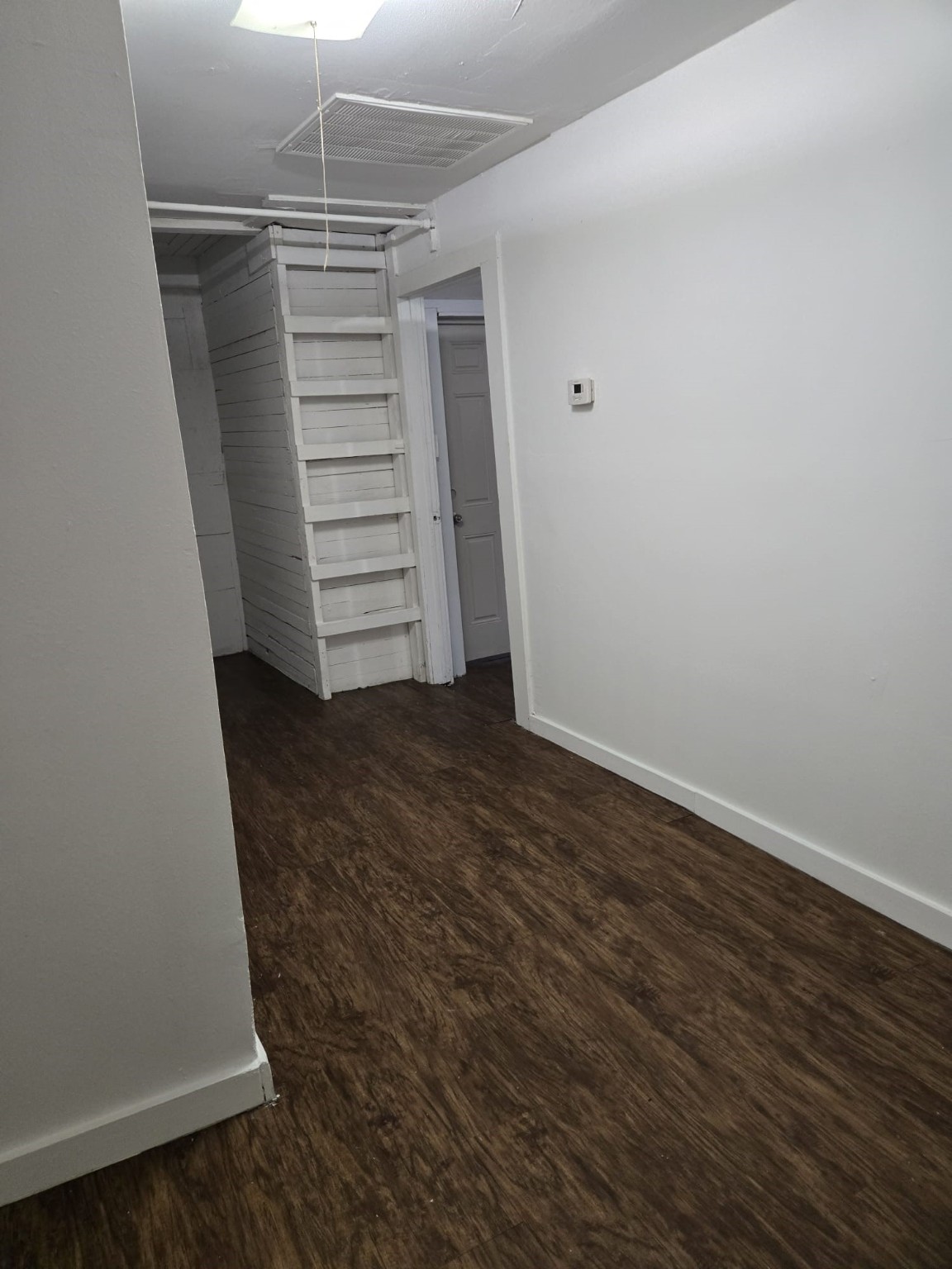 1104 Maple Street, Unit 2 La Marque, TX 77568 - Photo 4 of 16 a view of walk in closet with empty racks