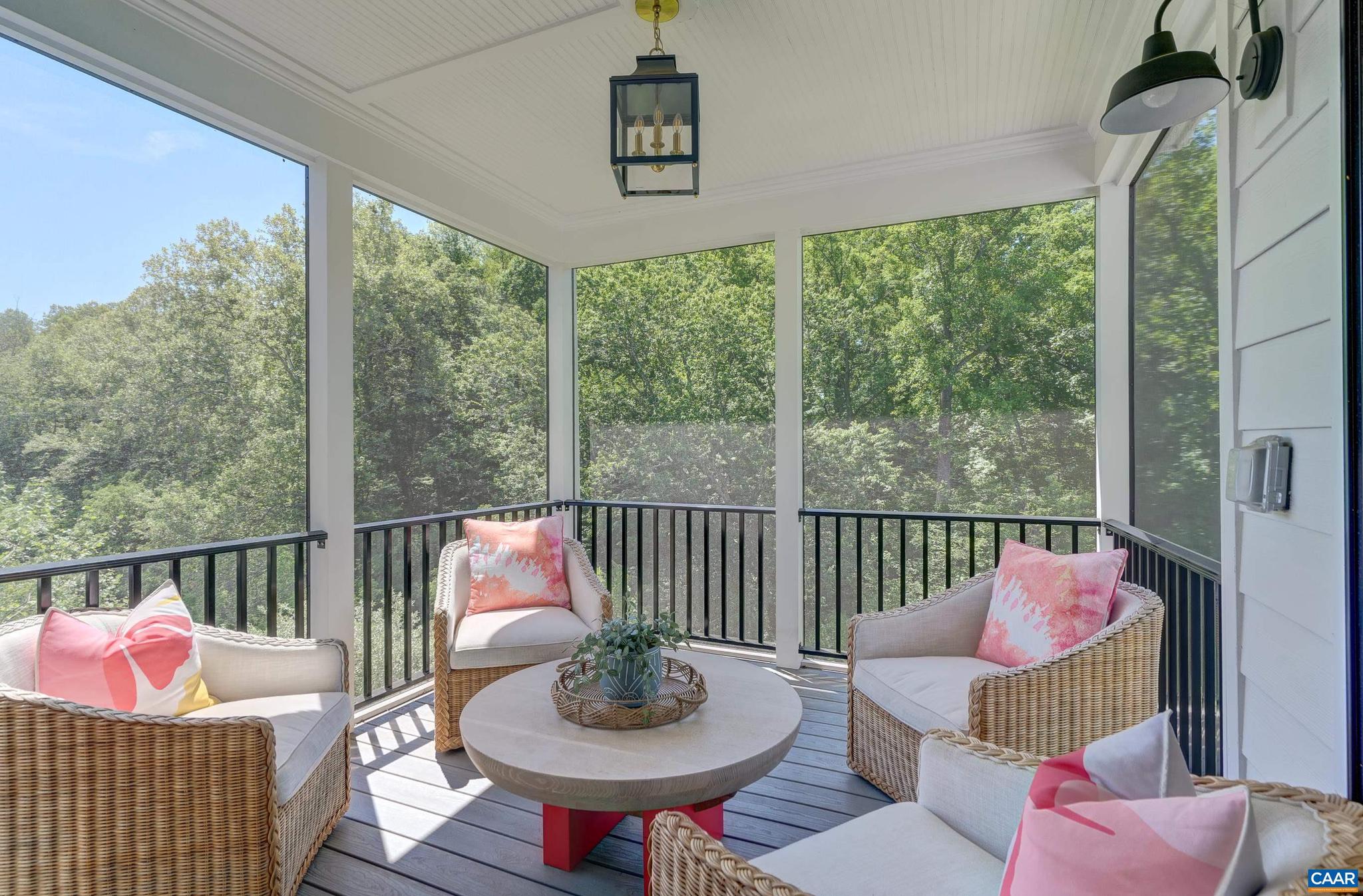 3327 Rowcross Street Crozet, VA 22932 - Photo 22 of 63 a outdoor living space with furniture and a potted plant
