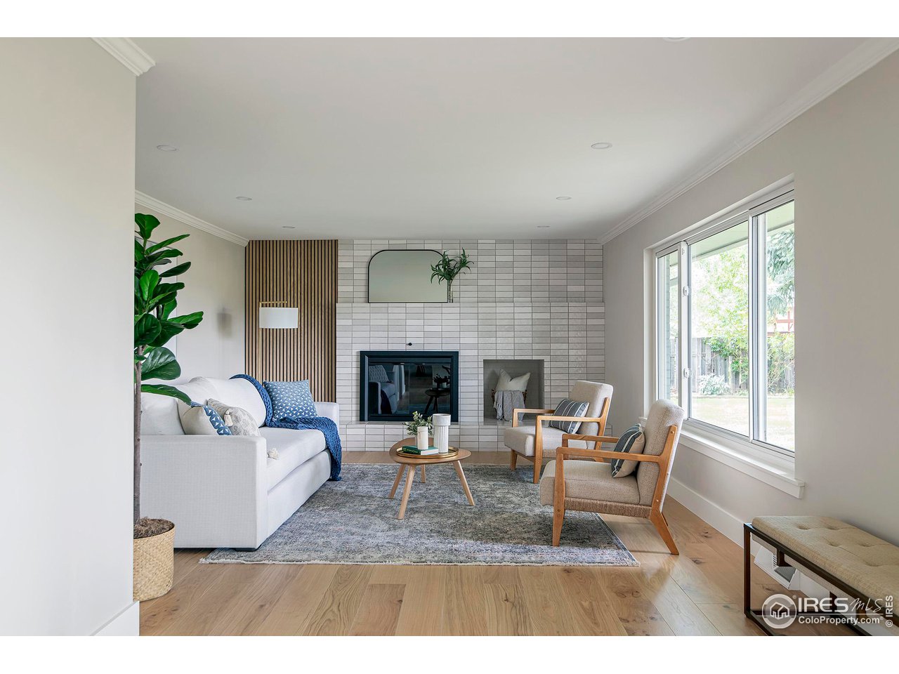 6978 Carter Trail Boulder, CO 80301 - Photo 15 of 39 a living room with furniture and a fireplace