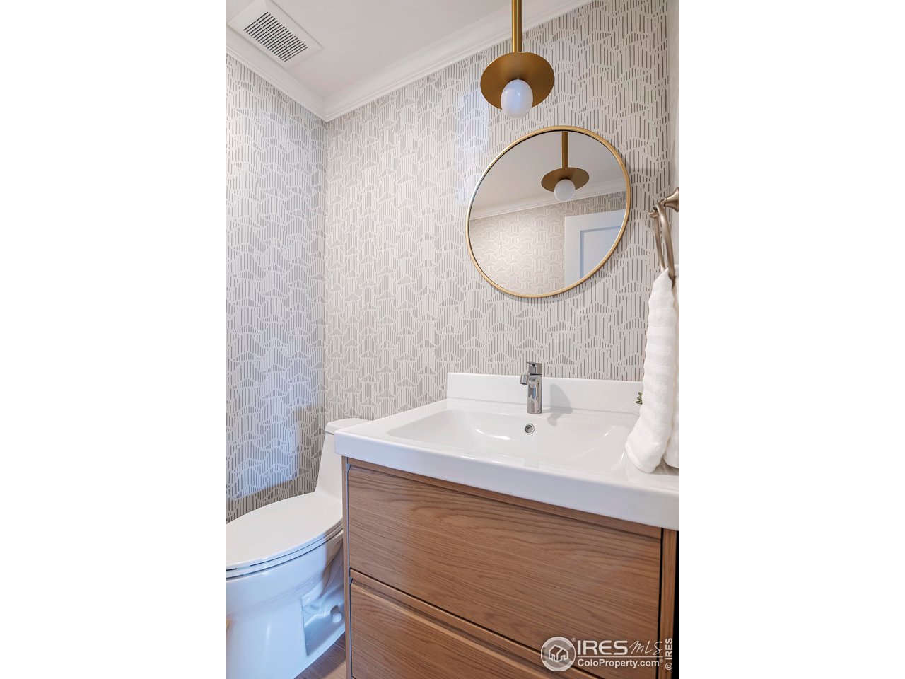 6978 Carter Trail Boulder, CO 80301 - Photo 32 of 39 a bathroom with a sink and a mirror