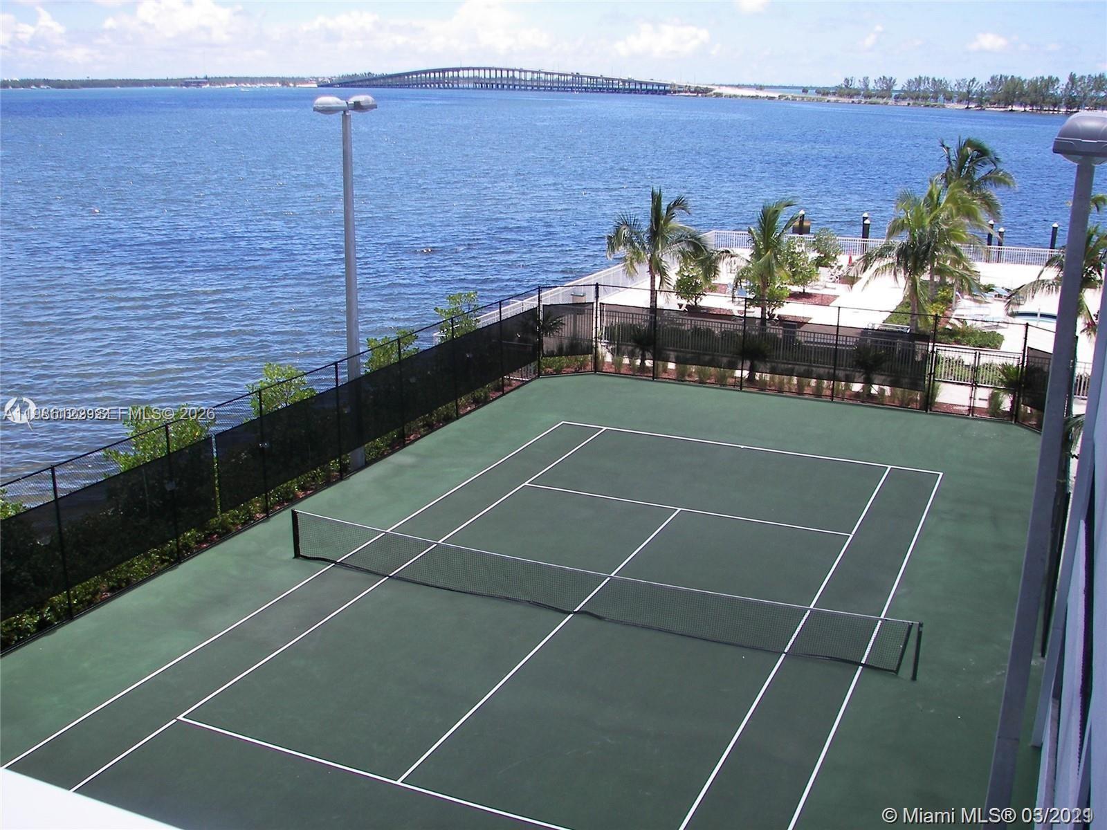 2101 Brickell Avenue, Unit 2102 Miami, FL 33129 - Photo 16 of 29 a view of a tennis court