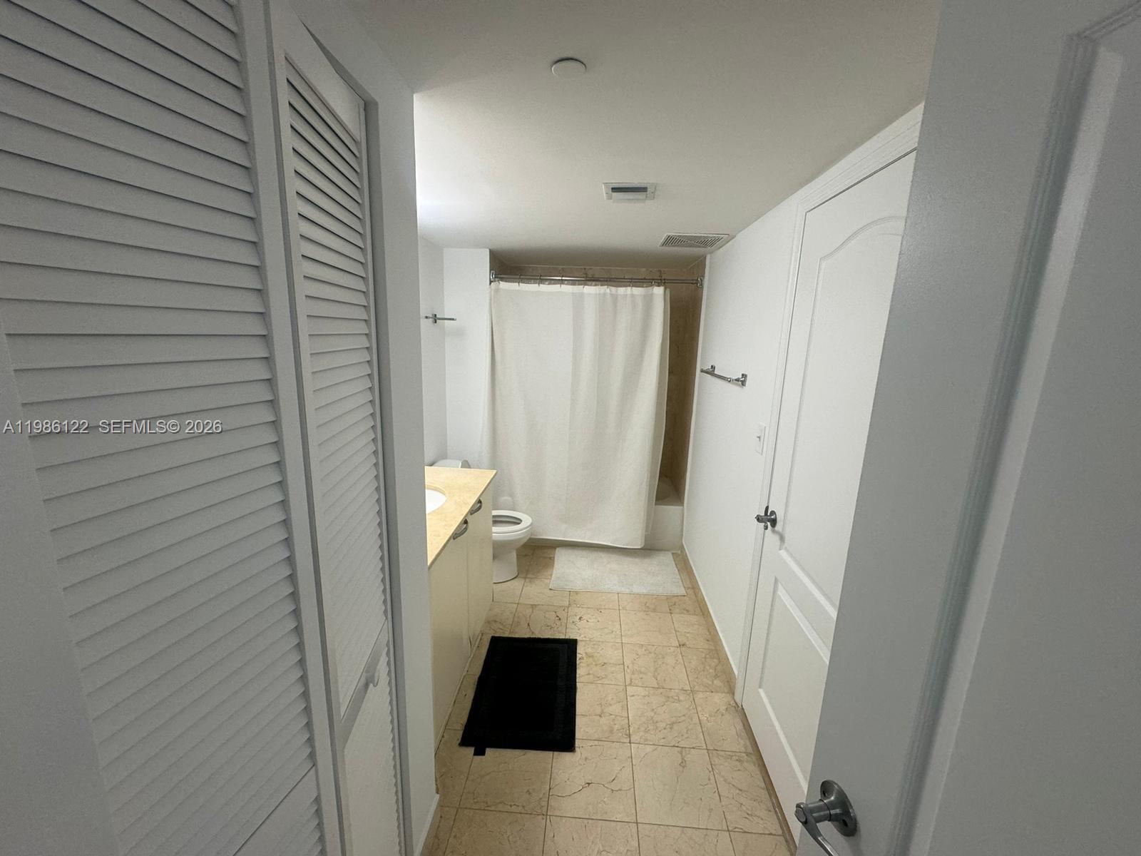 2101 Brickell Avenue, Unit 2102 Miami, FL 33129 - Photo 3 of 29 a view of a hallway