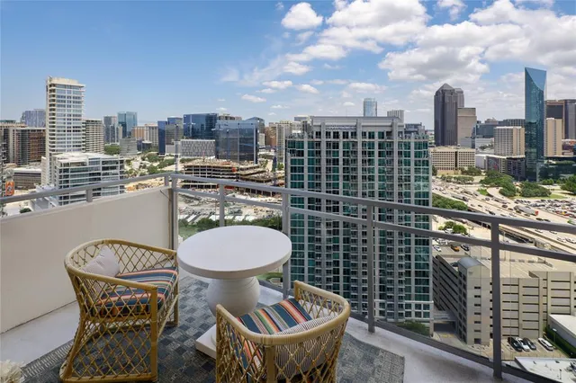 a view of a city with tall buildings