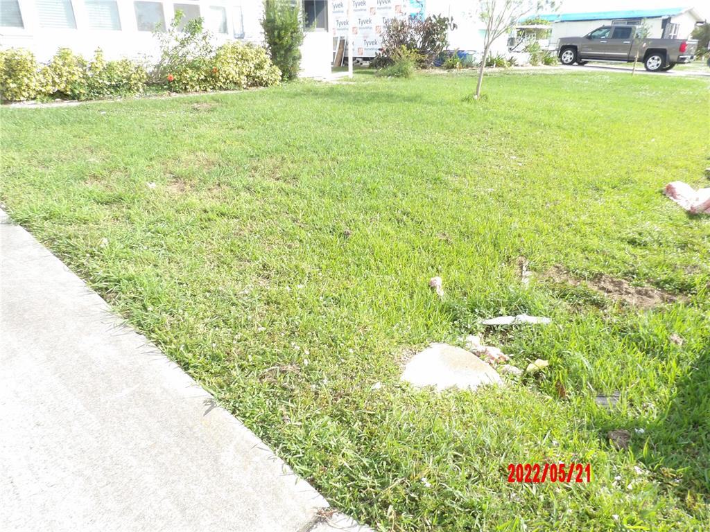 Lot with home still on it