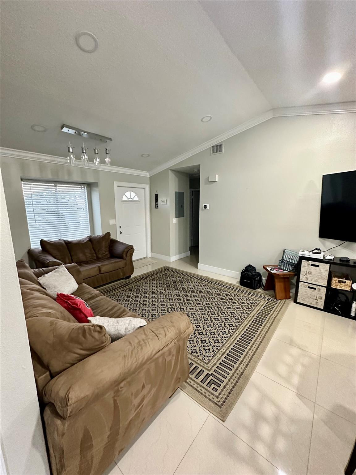 18814 Cloud Lake Circle Boca Raton, FL 33496 - Photo 19 of 19 a living room with furniture and a flat screen tv