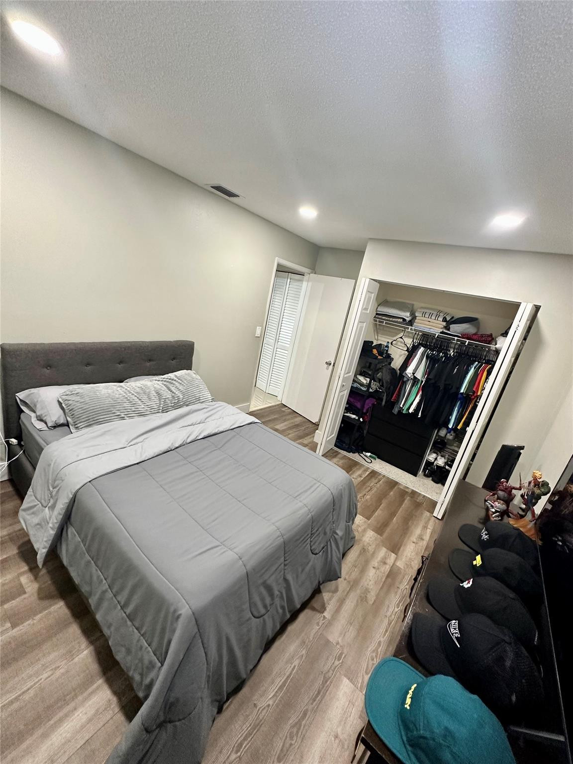 18814 Cloud Lake Circle Boca Raton, FL 33496 - Photo 10 of 19 a bedroom with a bed window and dresser