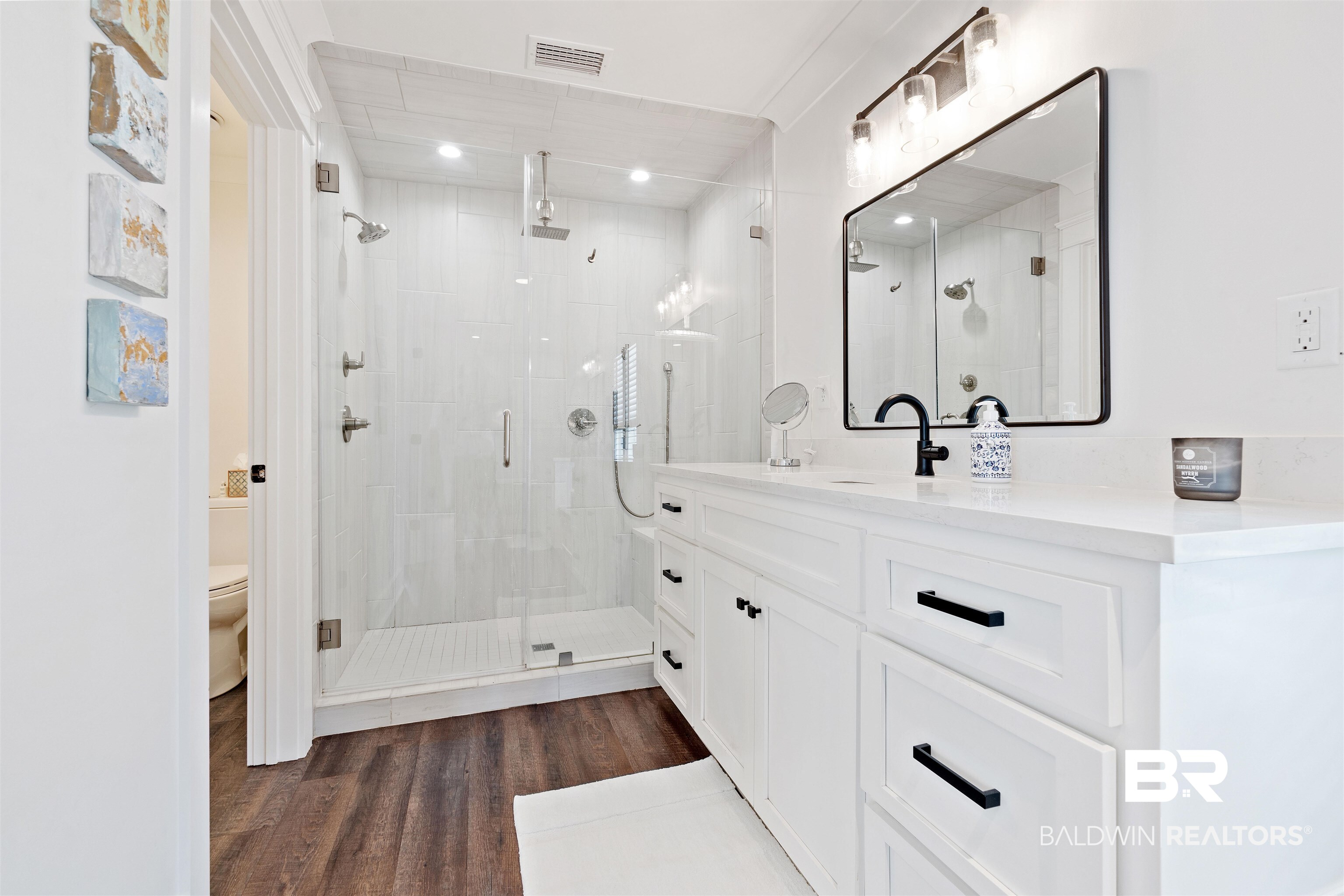 3808 Claridge Road North Mobile, AL 36608 - Photo 22 of 43 Bathroom with vanity, toilet, walk in shower, and hardwood / wood-style floors