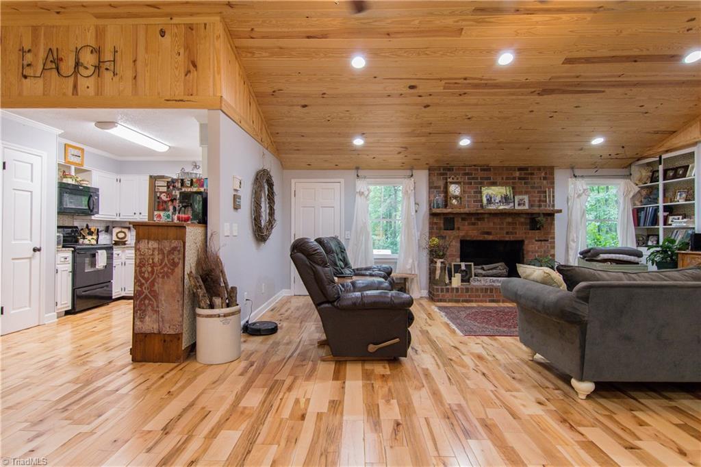 1661 Danny Bell Road Asheboro, NC 27205 - Photo 8 of 25 Living room with kitchen to the left.