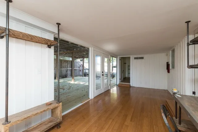 a view of an empty room and window