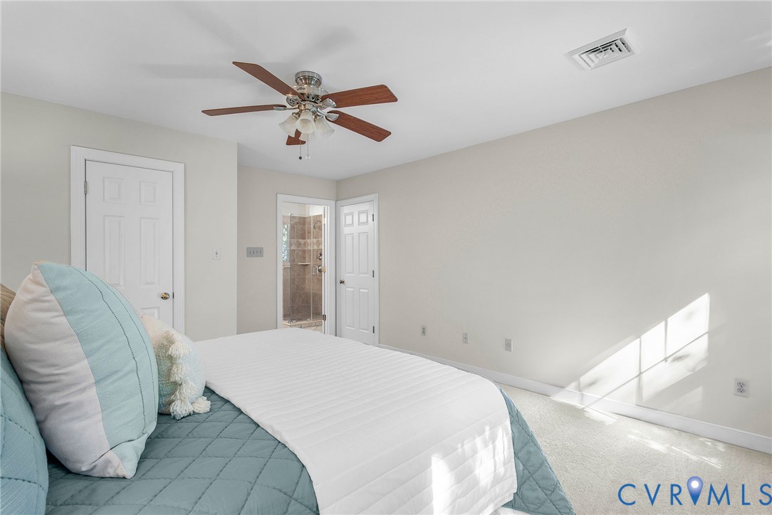 15010 Walnut Bend Road Midlothian, VA 23112 - Photo 21 of 35 a bedroom with a bed and window