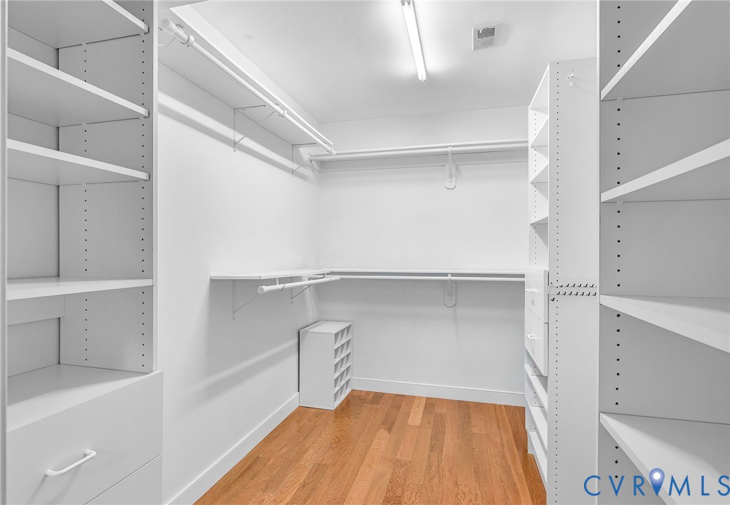 15010 Walnut Bend Road Midlothian, VA 23112 - Photo 24 of 35 a view of walk in closet with empty racks