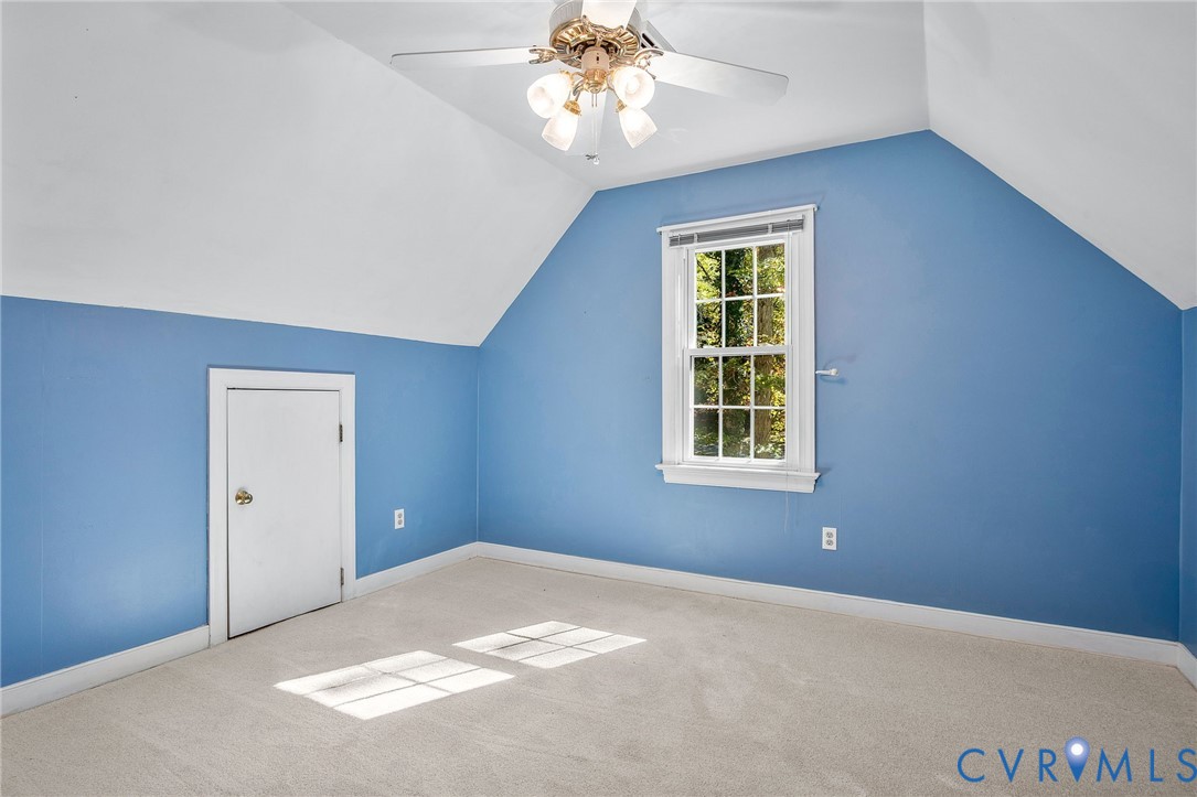15010 Walnut Bend Road Midlothian, VA 23112 - Photo 29 of 35 an empty room with windows and fan