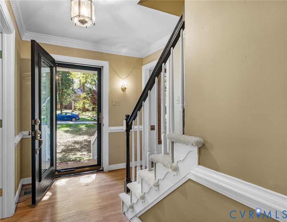 15010 Walnut Bend Road Midlothian, VA 23112 - Photo 4 of 35 a view of an entryway with hardwood