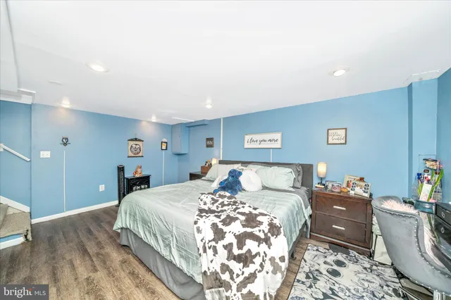 a bed room with a bed and a couch