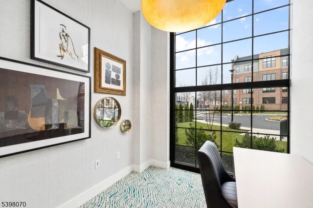 a view of a livingroom with furniture and window