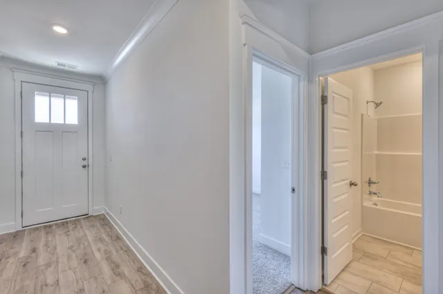 an empty room with closet area