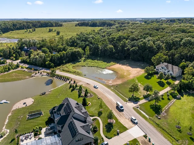 a view of a swimming pool with a yard