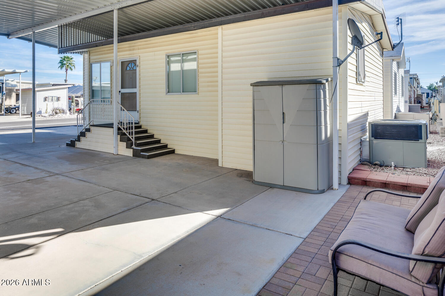 17200 West Bell Road, Unit 1260 Surprise, AZ 85374 - Photo 17 of 31 a view of a patio with wooden floor