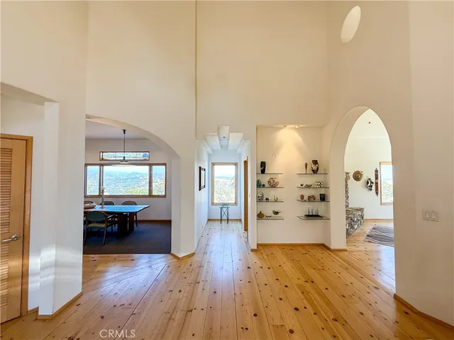 a dining room with a table and chairs