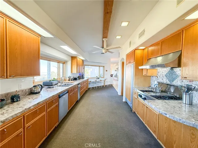 a bed room with a bed and a chair