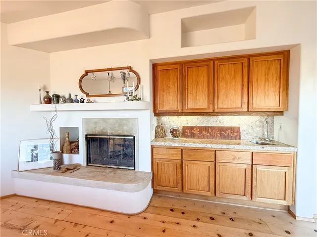 a bed room with a bed and a chair