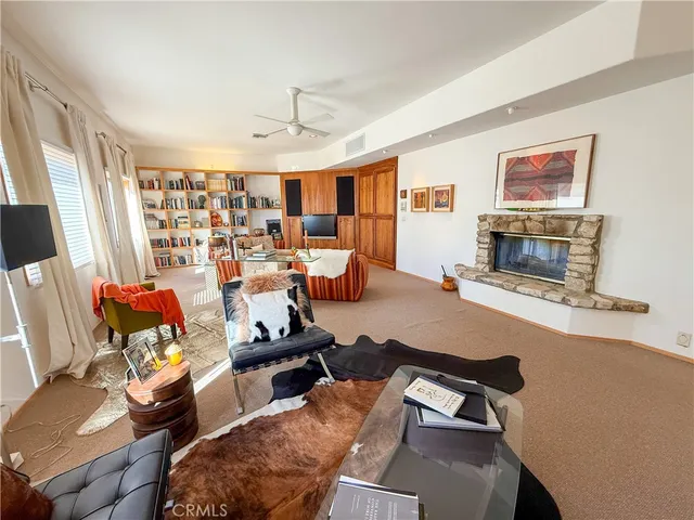 a view of a livingroom with furniture