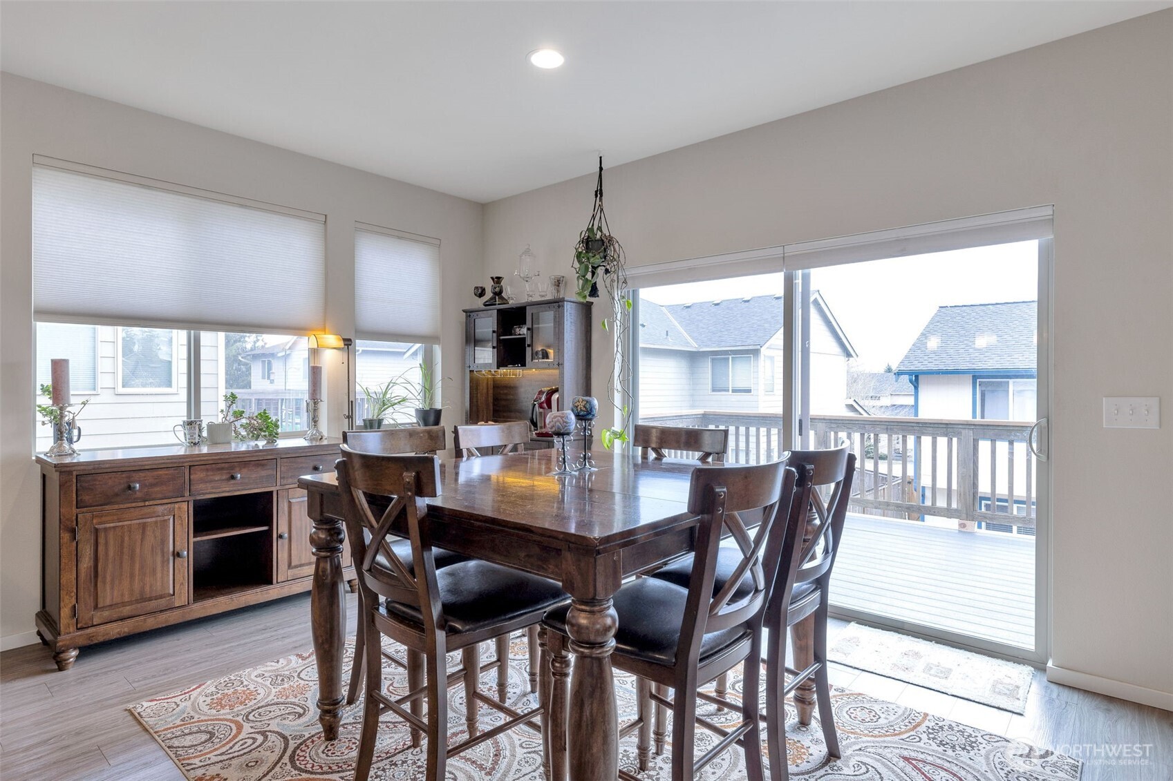 15817 Southeast 252 Place Covington, WA 98042 - Photo 13 of 31 a dining room with furniture a chandelier and wooden floor