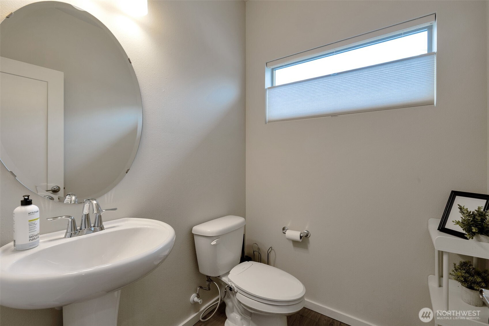 15817 Southeast 252 Place Covington, WA 98042 - Photo 14 of 31 a bathroom with a toilet a sink and mirror