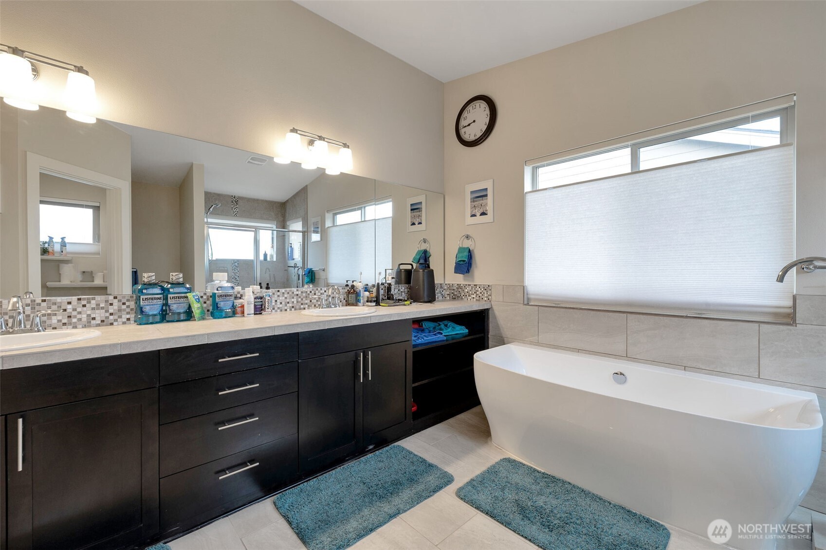15817 Southeast 252 Place Covington, WA 98042 - Photo 17 of 31 a spacious bathroom with a tub sink and mirror