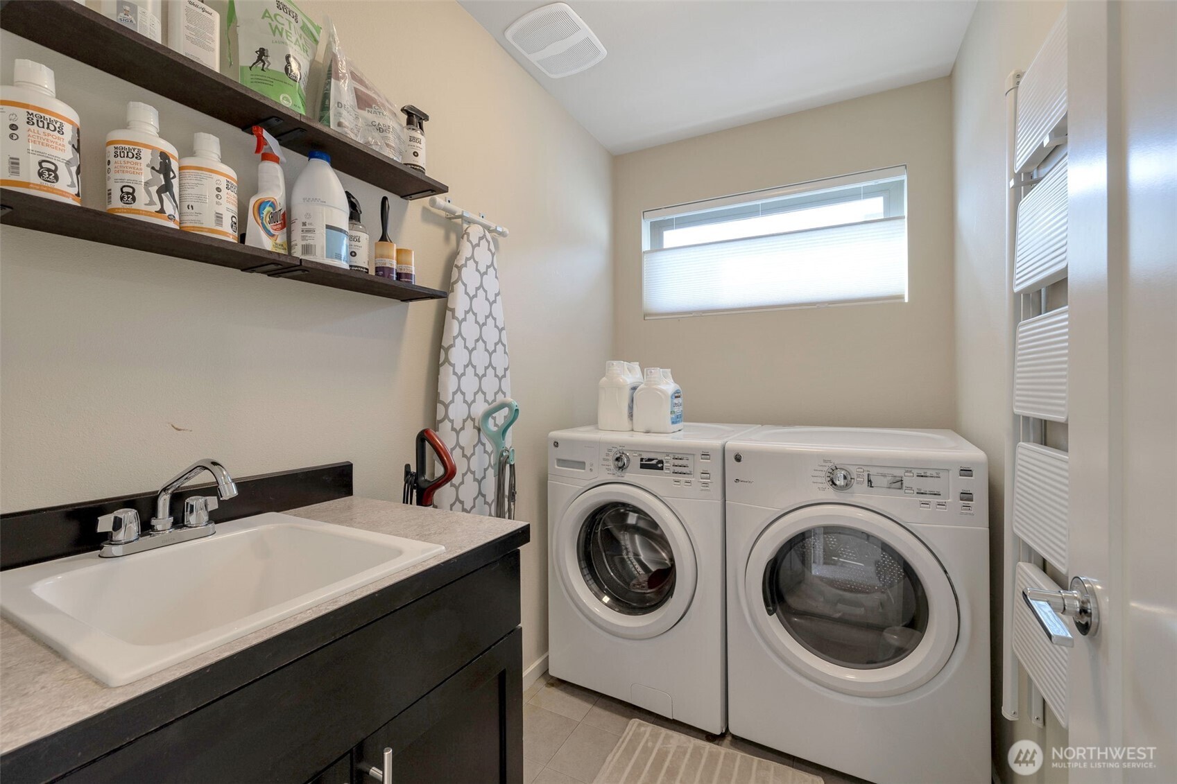 15817 Southeast 252 Place Covington, WA 98042 - Photo 19 of 31 a utility room with dryer and washer