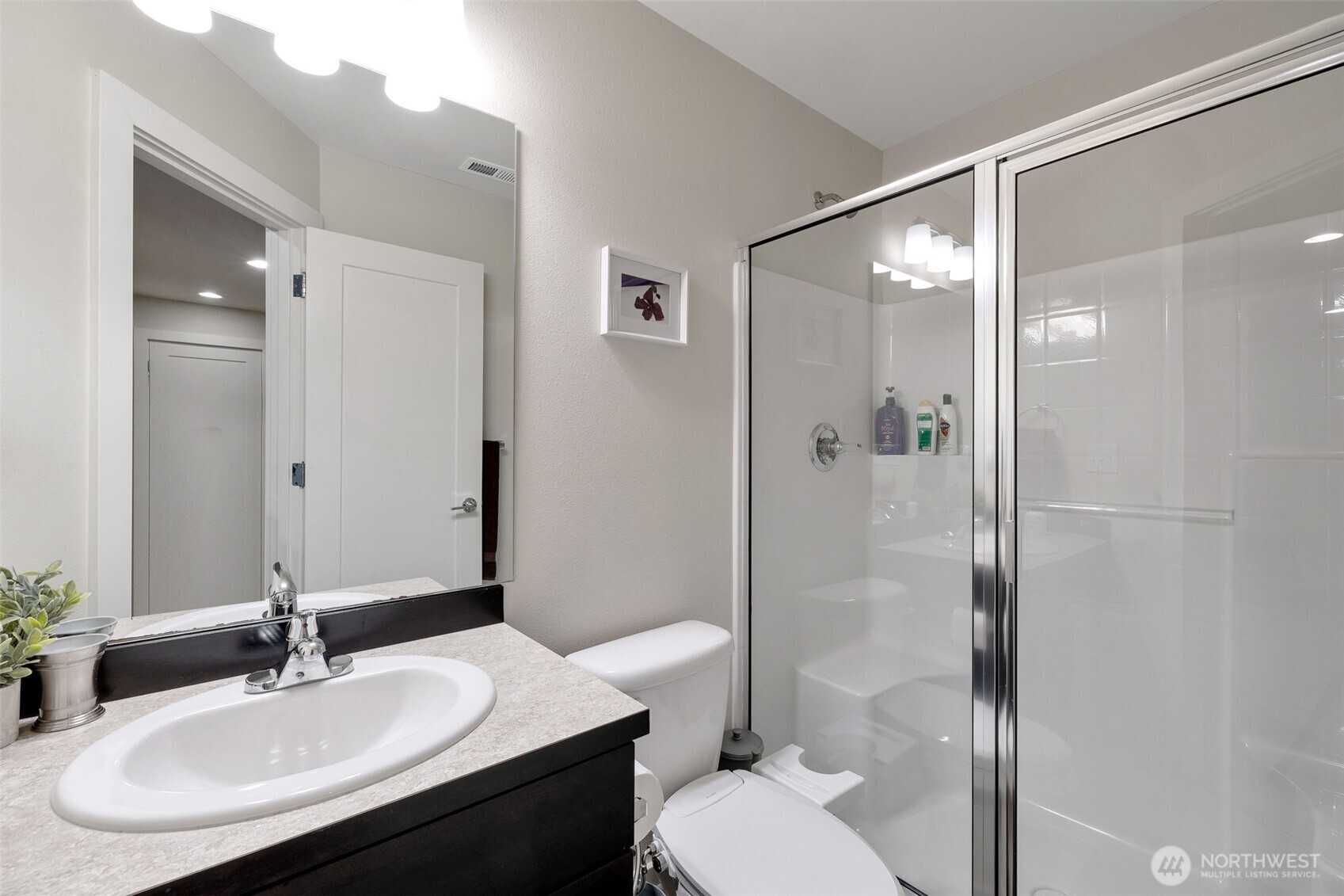 15817 Southeast 252 Place Covington, WA 98042 - Photo 25 of 31 a bathroom with a sink toilet and shower