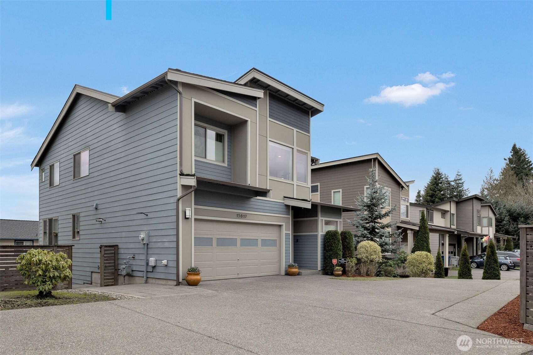 15817 Southeast 252 Place Covington, WA 98042 - Photo 4 of 31 a view of a house with a garage