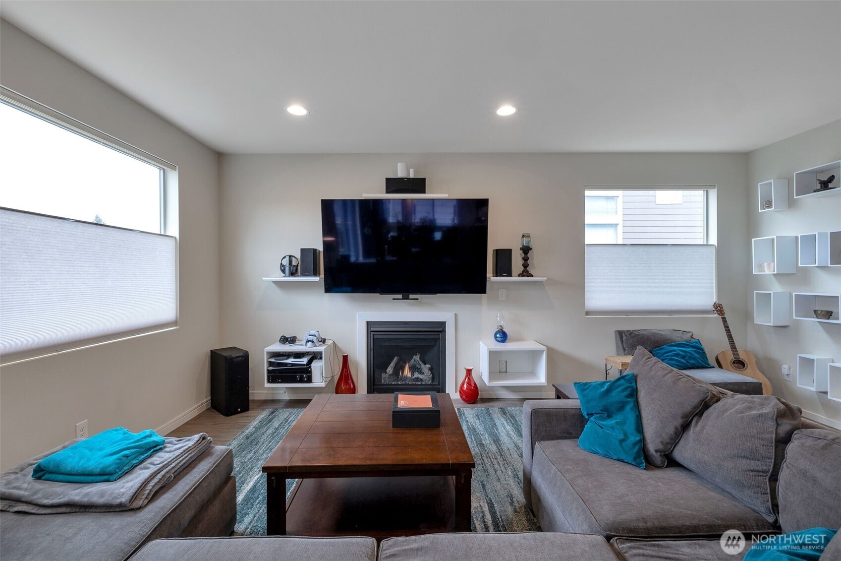 15817 Southeast 252 Place Covington, WA 98042 - Photo 7 of 31 a living room with furniture fireplace and flat screen tv