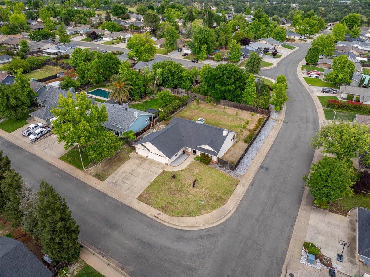 1675 Hominy Way Redding, CA 96003 - Photo 30 of 38 an aerial view of a house with a swimming pool