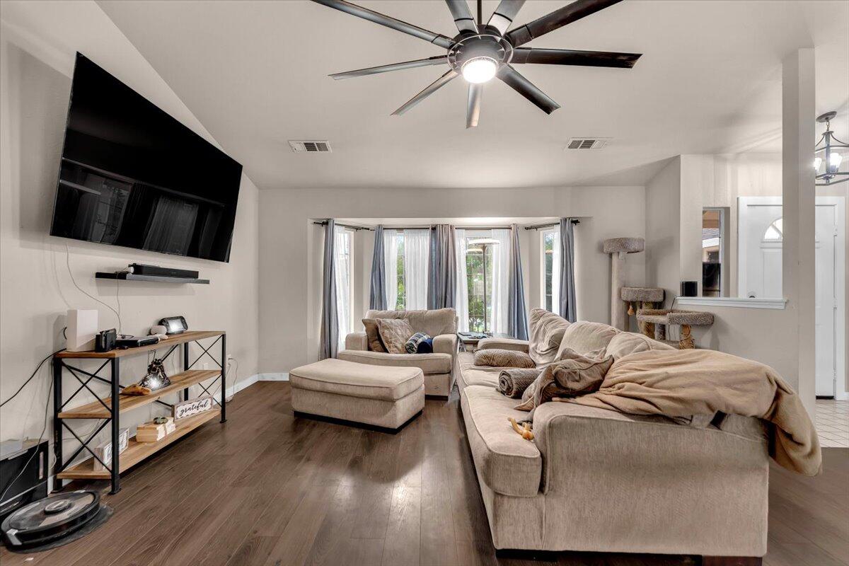 1675 Hominy Way Redding, CA 96003 - Photo 5 of 38 a living room with furniture and a flat screen tv