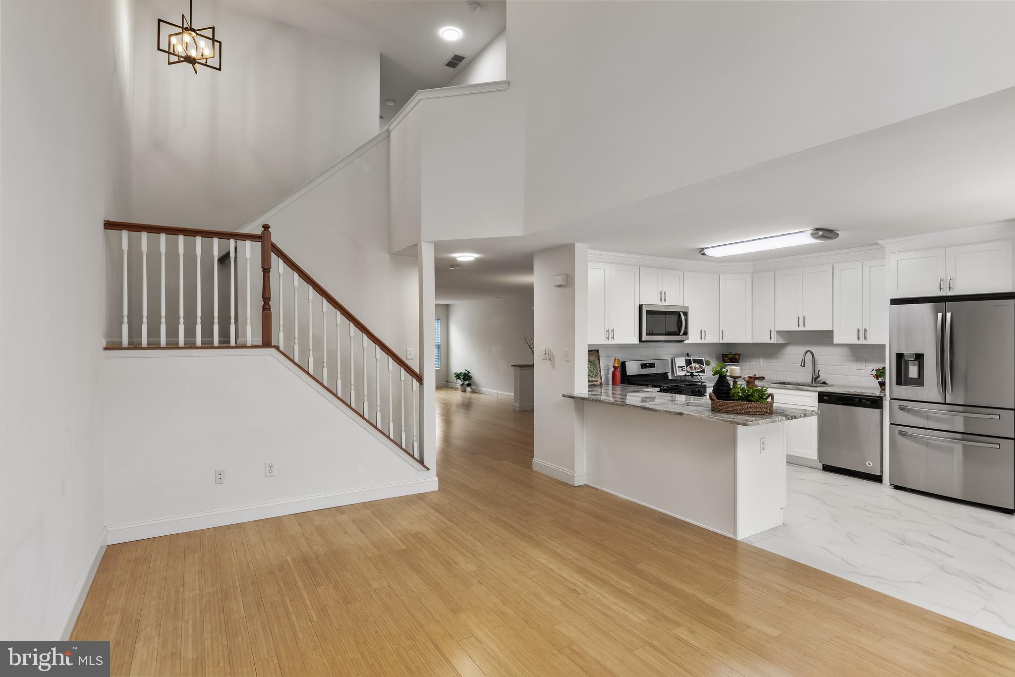773 Barton Run Boulevard Marlton, NJ 08053 - Photo 12 of 30 a view of a kitchen with furniture and wooden floor