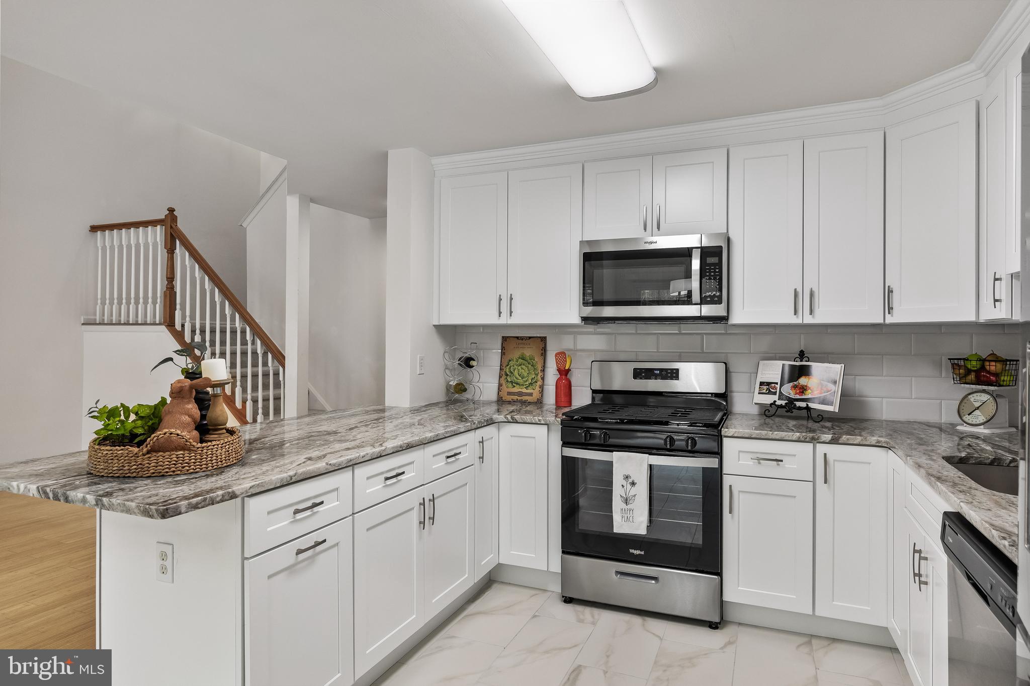 773 Barton Run Boulevard Marlton, NJ 08053 - Photo 16 of 30 a kitchen with white cabinets and appliances