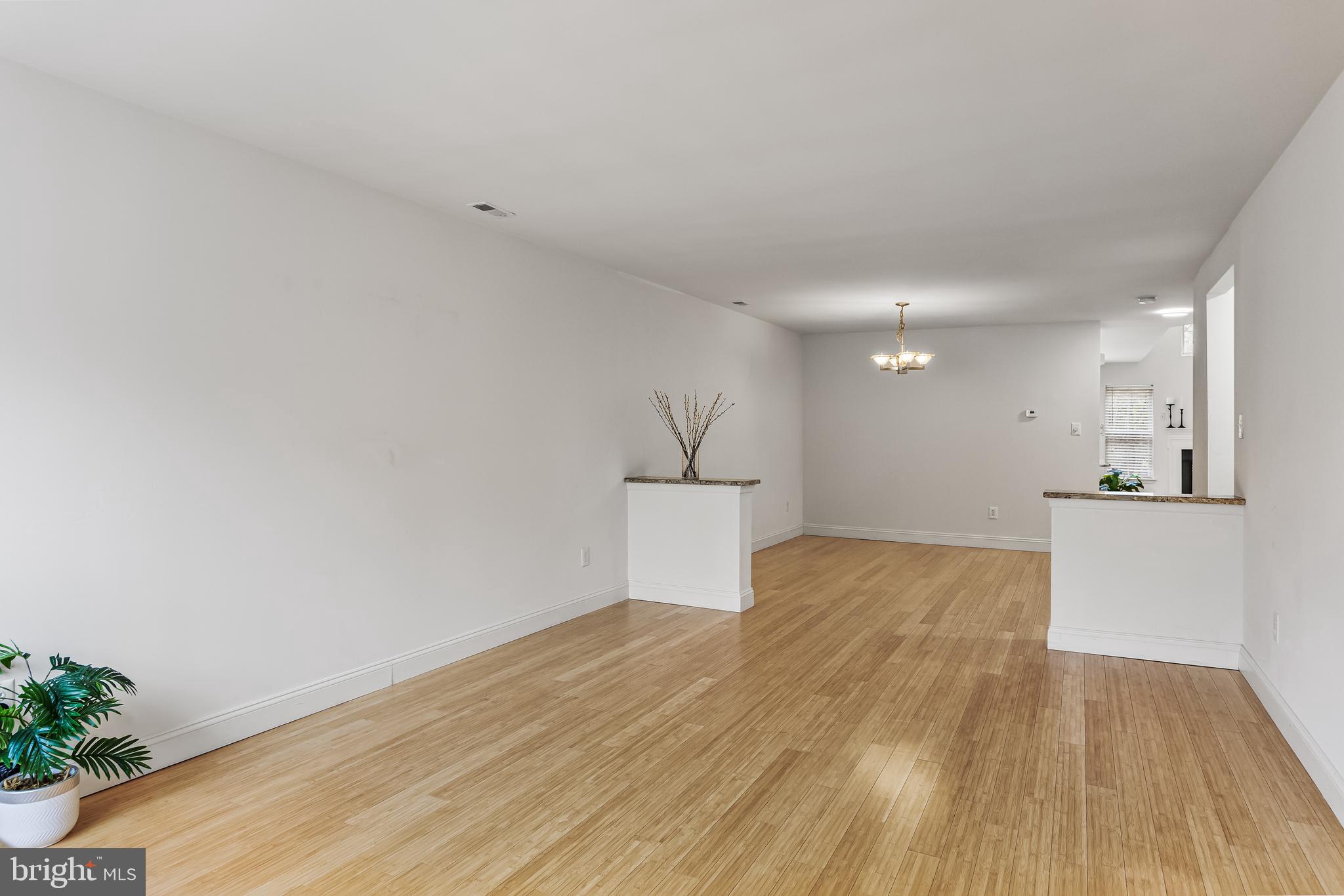 773 Barton Run Boulevard Marlton, NJ 08053 - Photo 4 of 30 a view of a kitchen with wooden floor and a sink