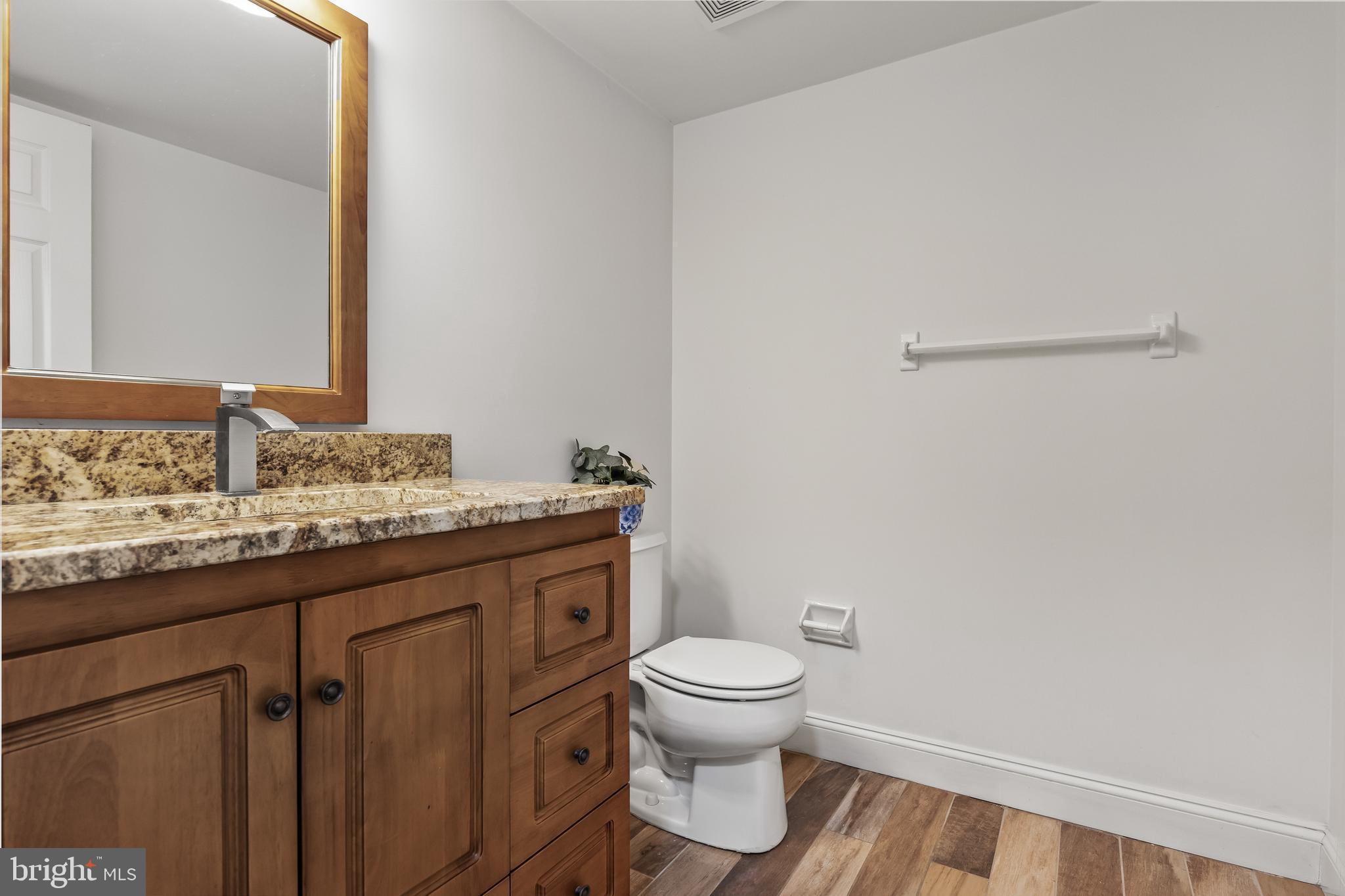 773 Barton Run Boulevard Marlton, NJ 08053 - Photo 9 of 30 a bathroom with a granite countertop toilet sink and mirror