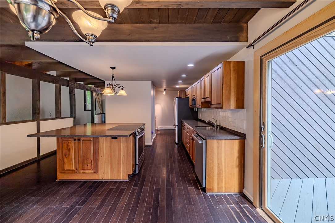 33560 Lamb Road Carthage, NY 13619 - Photo 13 of 50 view to of kitchen to wet bar and garage