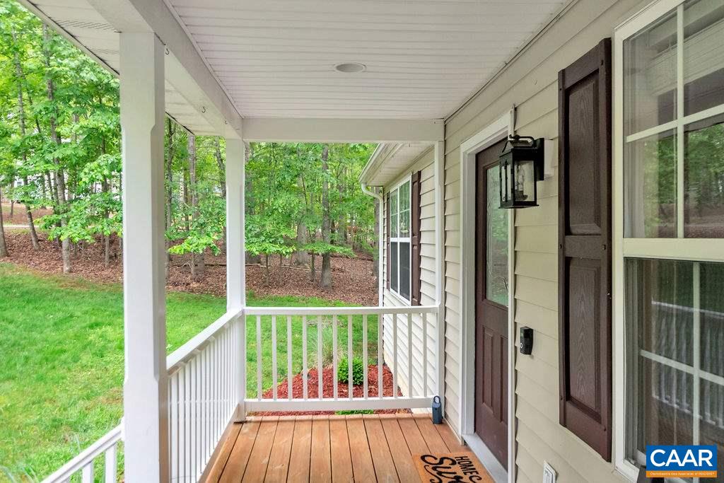 37 Amethyst Road Palmyra, VA 22963 - Photo 3 of 46 a view of balcony with floor to ceiling window and wooden floor