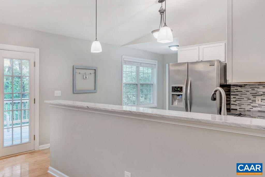 37 Amethyst Road Palmyra, VA 22963 - Photo 8 of 46 a view of a kitchen with a stove cabinets and a refrigerator