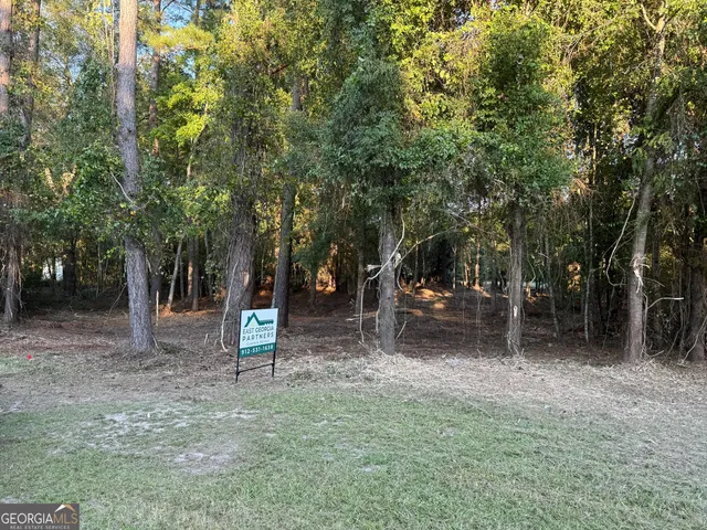 a view of park with trees