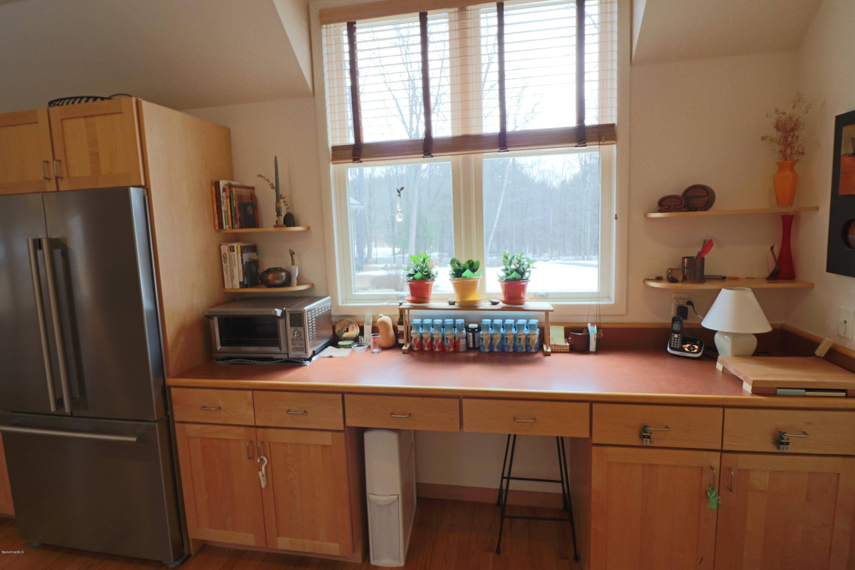 131 Tyringham Road Otis, MA 01253 - Photo 22 of 46 a kitchen with a refrigerator and a sink